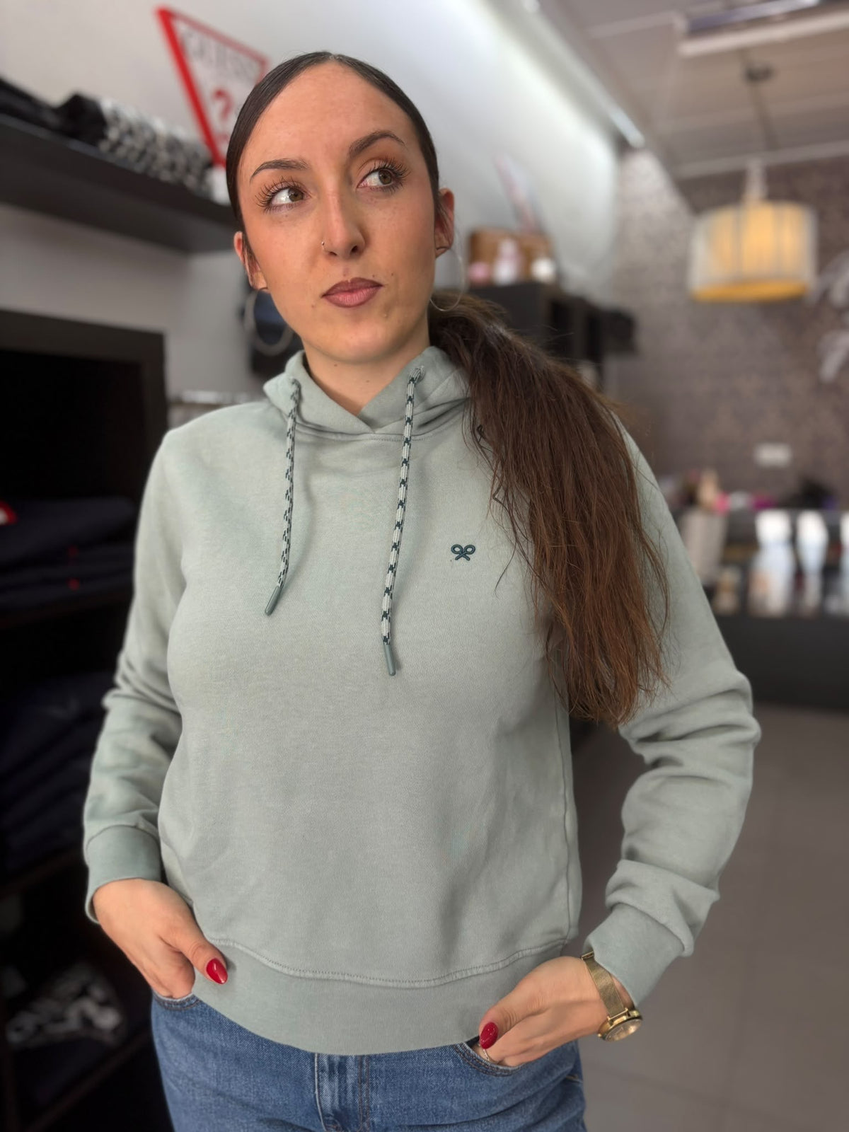 Sudadera Silbon rebel verde con capucha y logo en la espalda