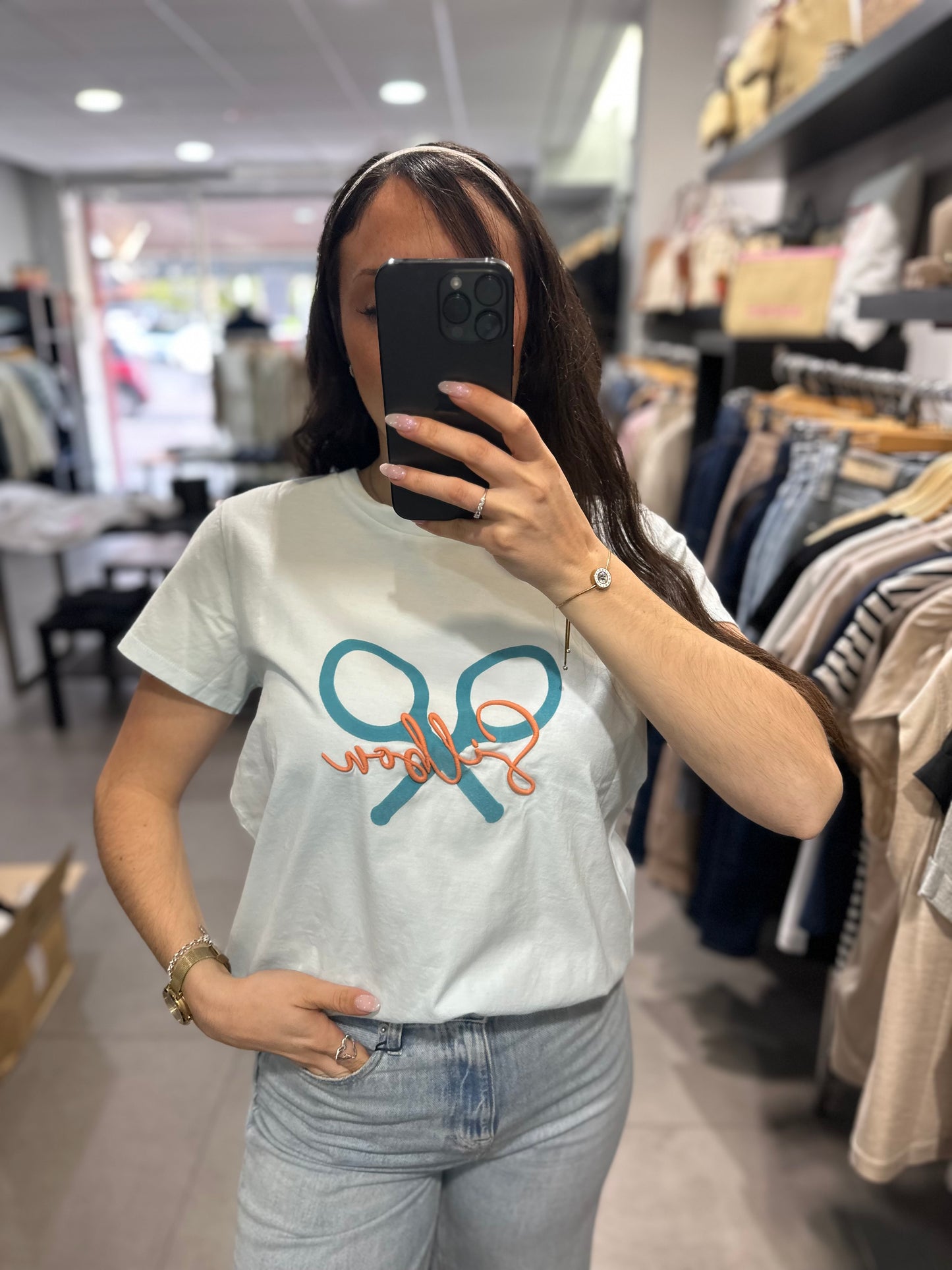 Camiseta Silbon azul celeste logo naranja pastel