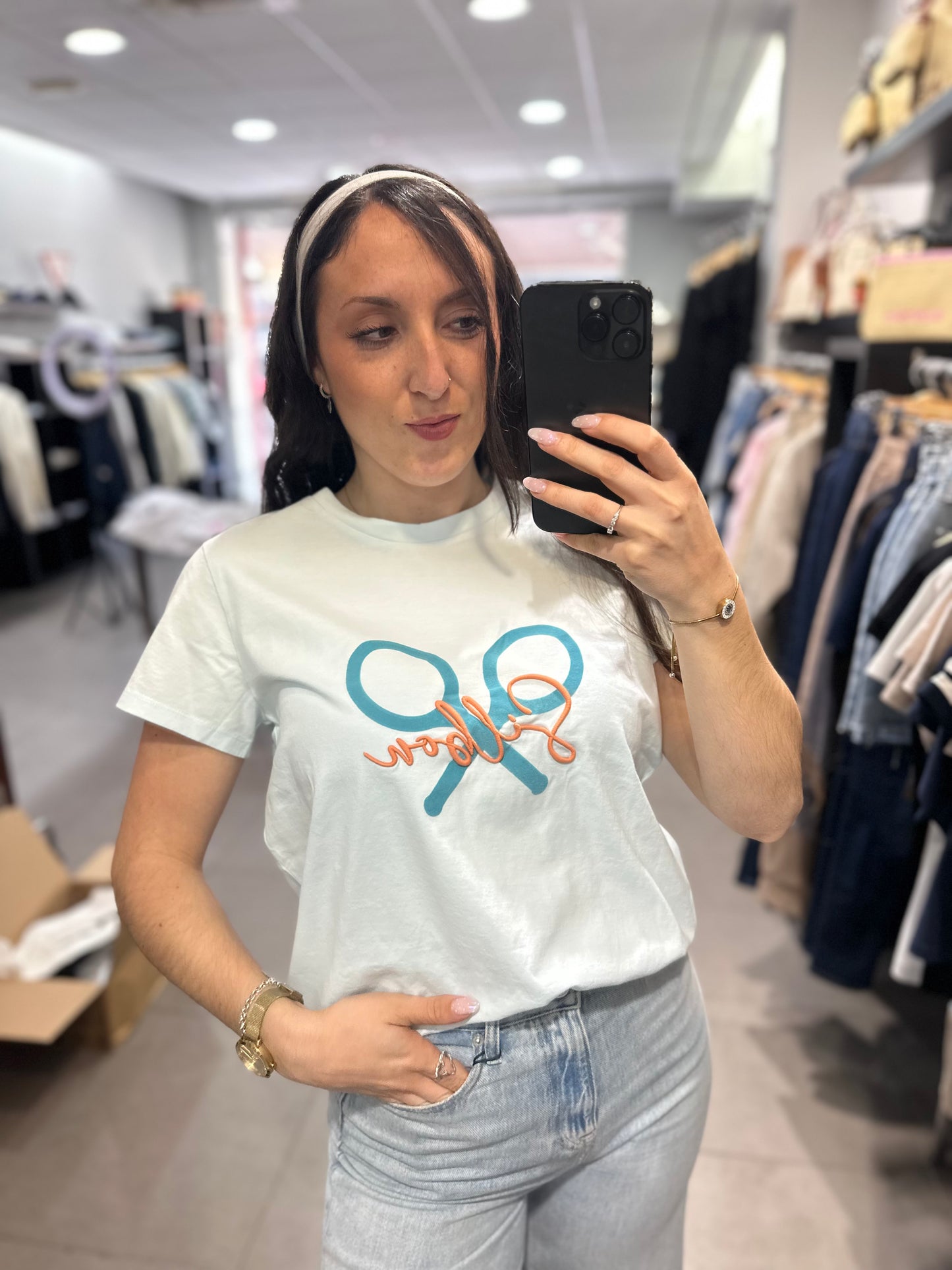 Camiseta Silbon azul celeste logo naranja pastel