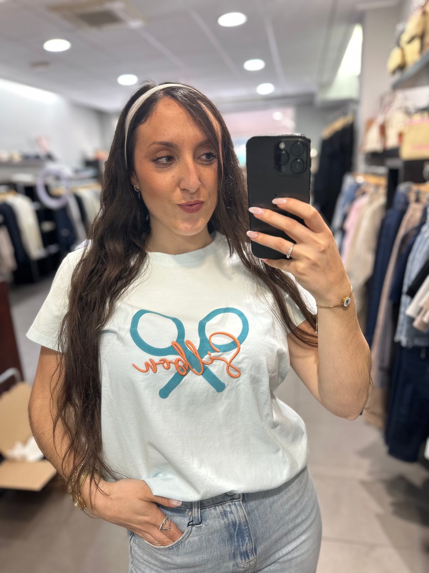 Camiseta Silbon azul celeste logo naranja pastel